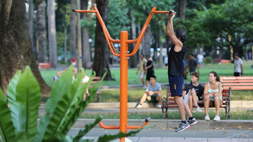 senior man exercise in Saigon Bridge park | Feature | 4 Best Places to Exercise in Thao Dien for Free